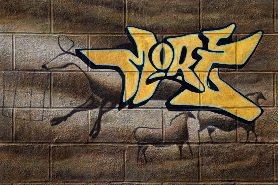 Prehistoric art vs. graffiti tag art in this painting by Nolan Haan, which juxtaposes cave Lascaux prehistoric art with graffiti writing by MORE