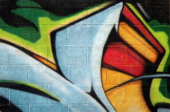 Contemporary paintings by Nolan Haan featuring graffiti artist MSK on trompe l oeil cinder block wall