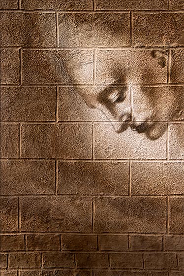 Michelangelo ‘s Sanguine interpreted by Nolan Haan in his new art paintings of trompe l’oeil cinderblock walls