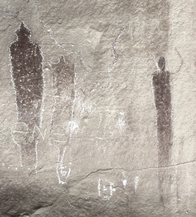 cave painting with figures 